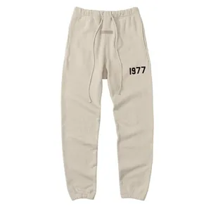 Fear of God Essentials 1977 SweatPants Beige フィアオブゴッド エッセンシャルズ 1977 スウェットパンツ ベージュ（Fear of God 140）