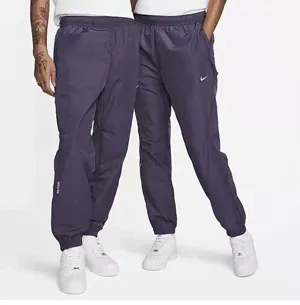 Nike x Drake NOCTA Truck Pants ナイキ x ノクタ ドレイク トラックパンツ ブラックとパープル 2色（Nike 21）